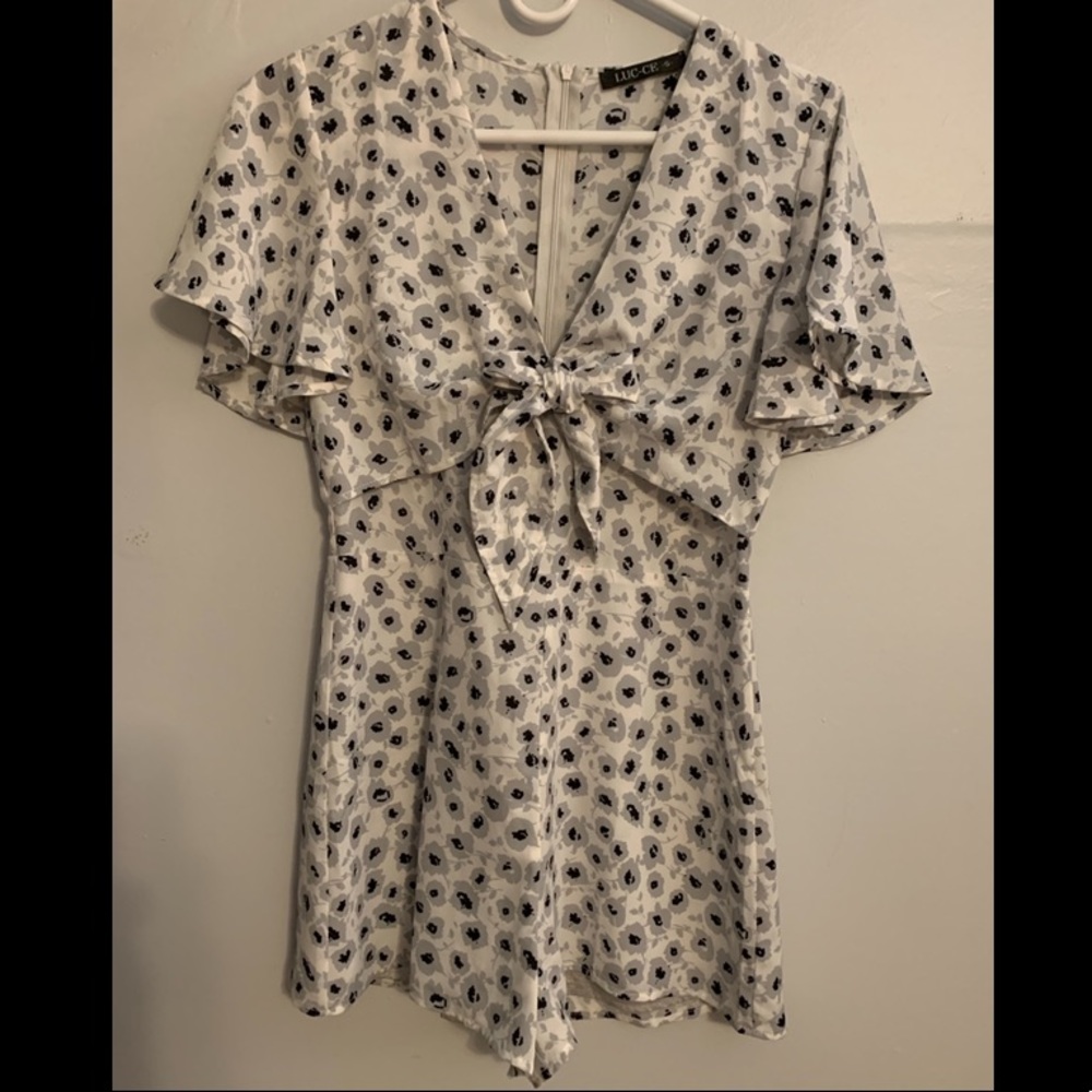 Floral LUC-CE romper. Size small.